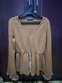 Tassel Peplum Top