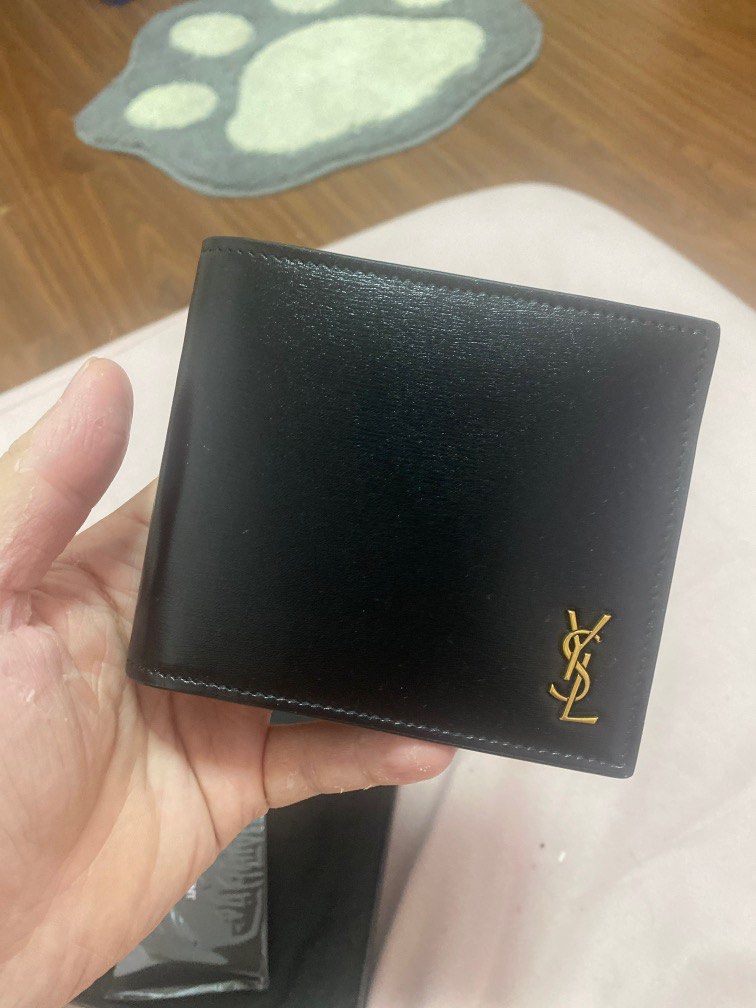 ysl hand wallet