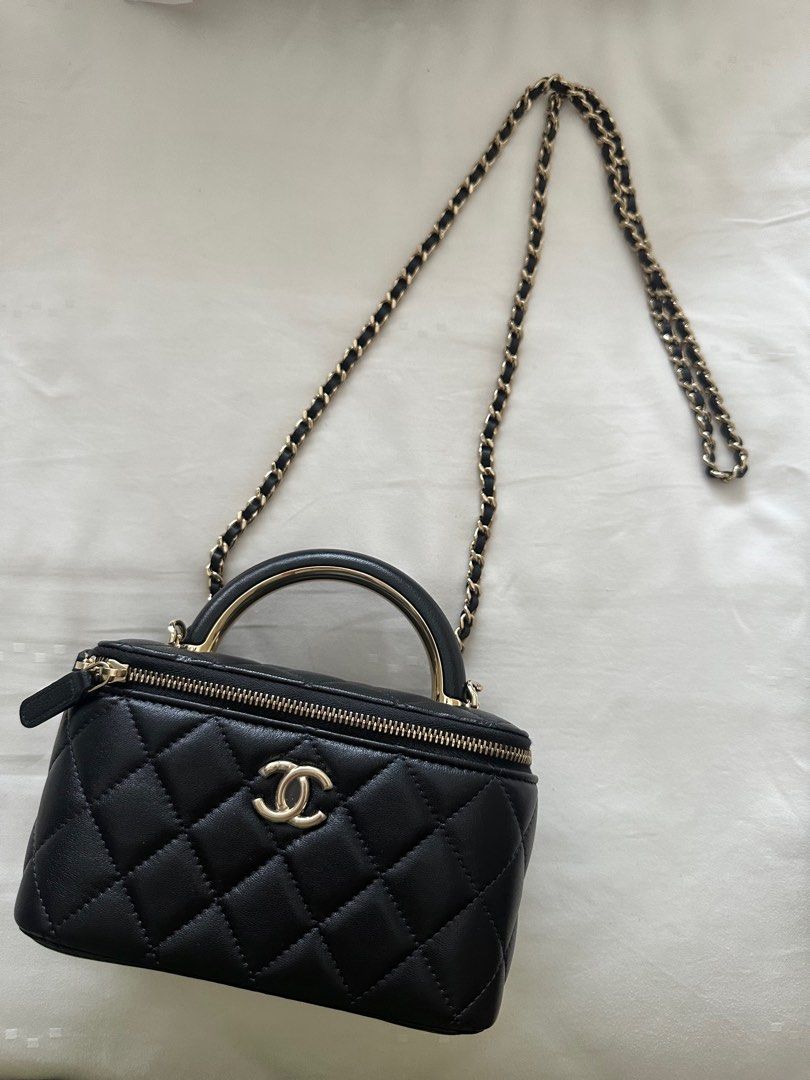 Authentic black Chanel Vanity Bag with top handle, Luxury, Bags & Wallets  on Carousell