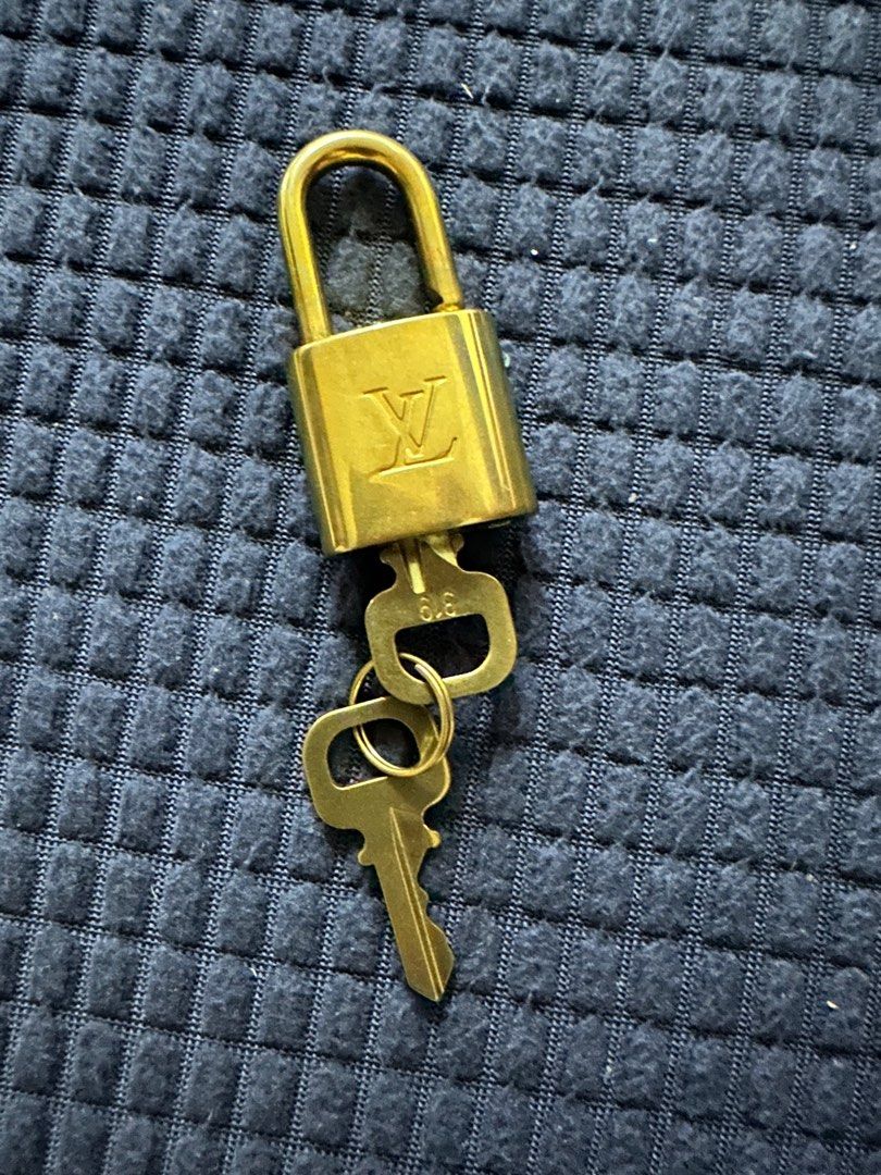 Authentic Louis Vuitton Lock and Keys, Luxury, Accessories on Carousell