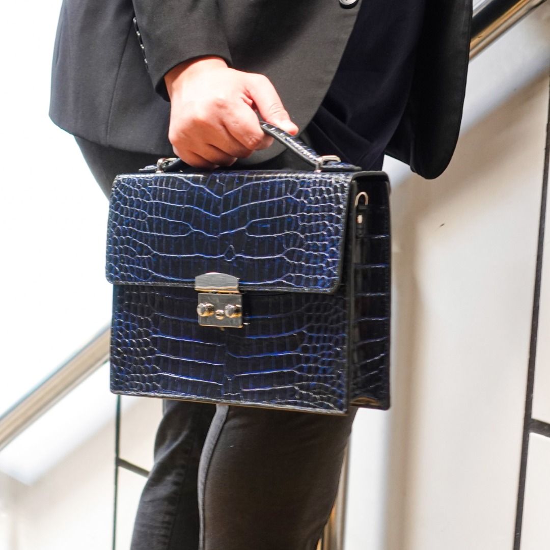 Crocodile leather laptop best sale bag