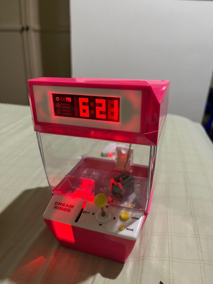 Alarm clock claw machine store