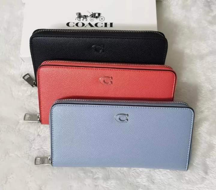 Coach zip around universal wallet in embossed signature canvas outlet