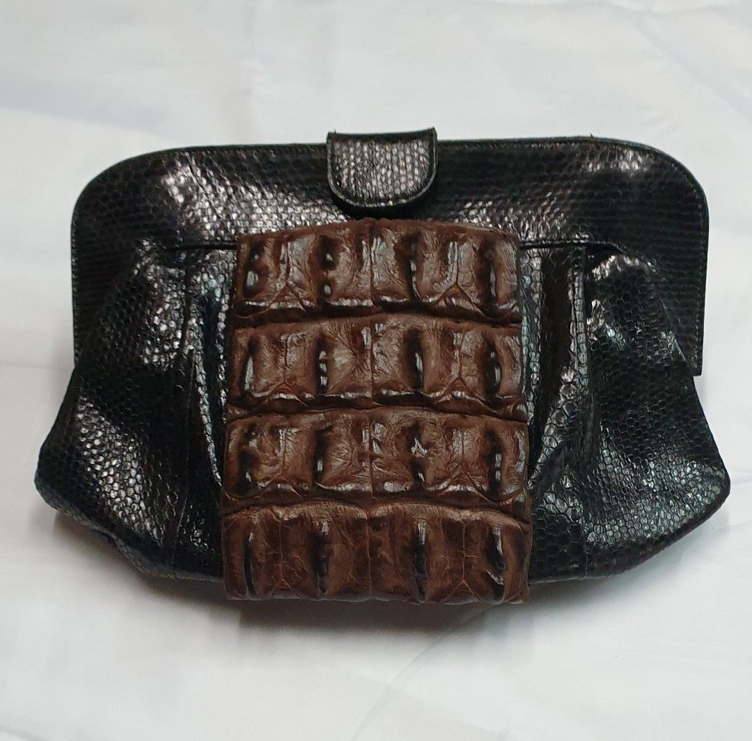Crocodile with snake clutch (Category: Luxury Bags & Wallets) located in Quezon City. Submitted by ilovenystuff (Listing ID 1243022453, Image 1). Description: Crocodile with snakeskin clutch real crocodile skin.