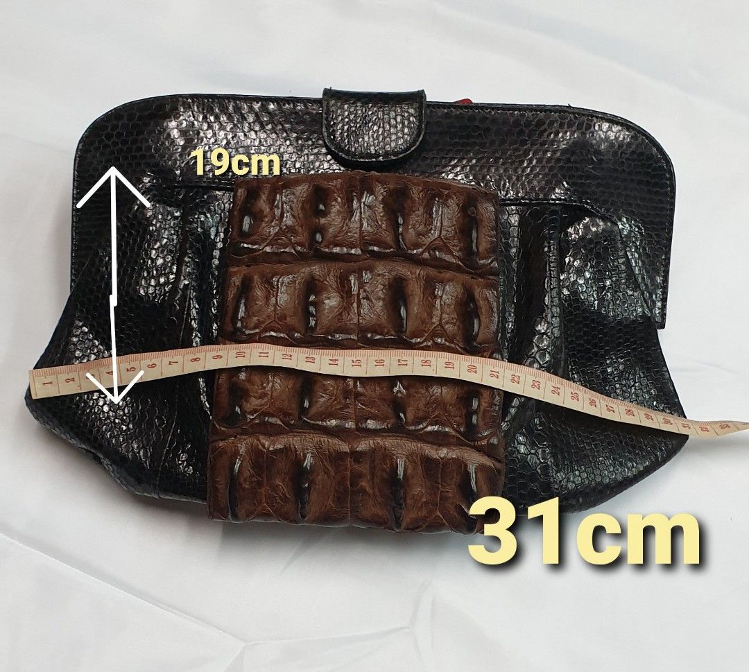 Crocodile with snake clutch (Category: Luxury Bags & Wallets) located in Quezon City. Submitted by ilovenystuff (Listing ID 1243022453, Image 2). Description: Crocodile with snakeskin clutch real crocodile skin.