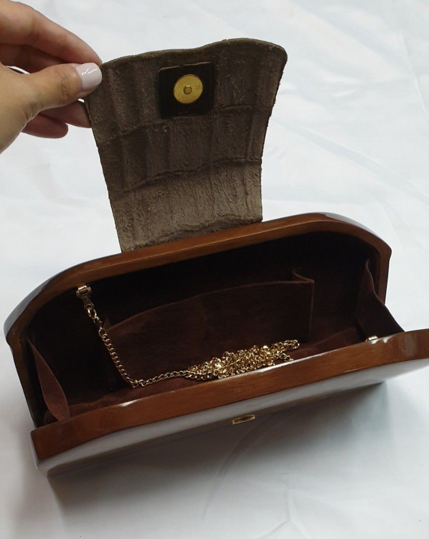 Crocodile wood clutch 2 (Category: Luxury Bags & Wallets) located in Quezon City. Submitted by ilovenystuff (Listing ID 1243023436, Image 3). Description: Crocodile wood clutch with gold chain.
