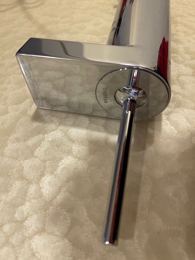 *Hansgrohe* Hot and cold single lever basin mixer for wash bowls with