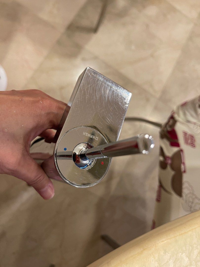 *Hansgrohe* Hot and cold single lever basin mixer for wash bowls with