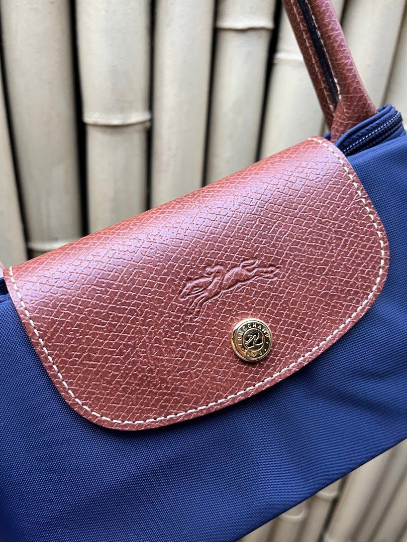 Rustan's - Discover the Longchamp Le Pliage Filet bag, a