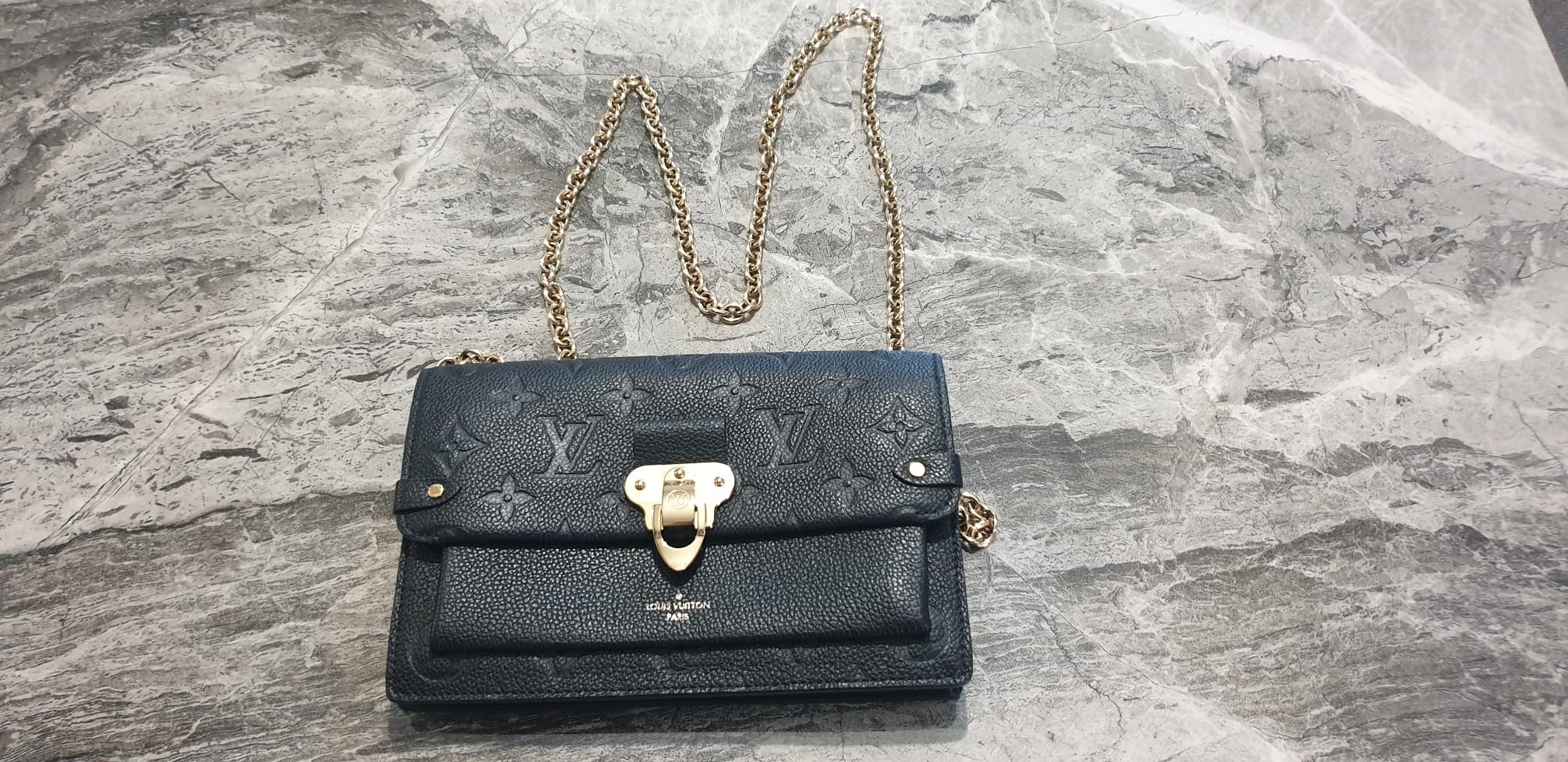 Louis Vuitton Vavin WOC Noir Monogram Empreinte Leather Bag, Luxury, Bags &  Wallets on Carousell