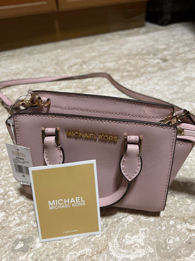 Michael Kors Mercer Small Pink Leather Bucket Crossbody Bag –  handmethebag.com