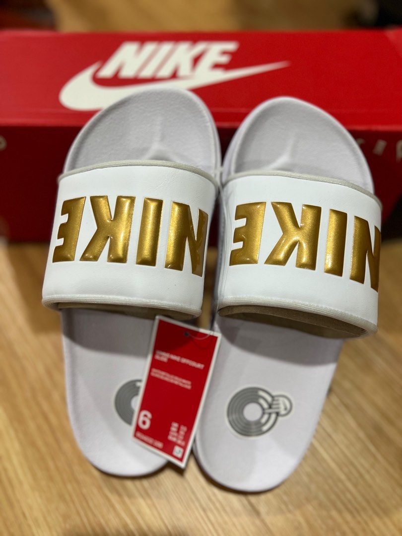 White and gold nike slides sale