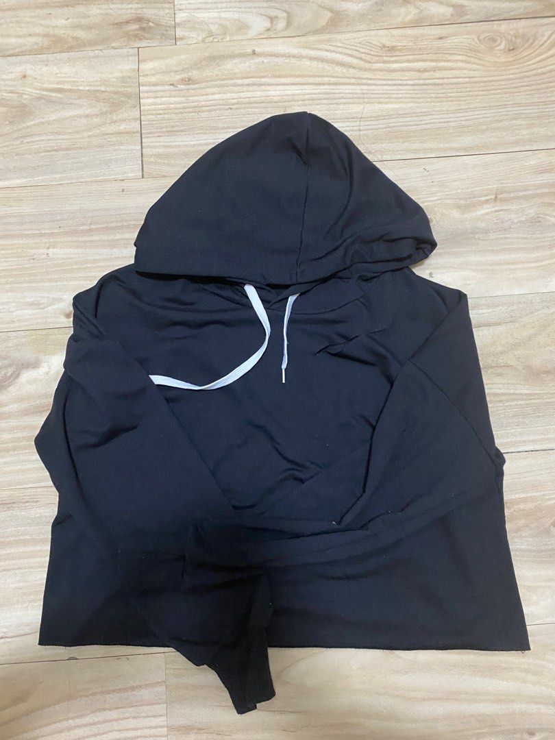 Black sweater deals with white strings