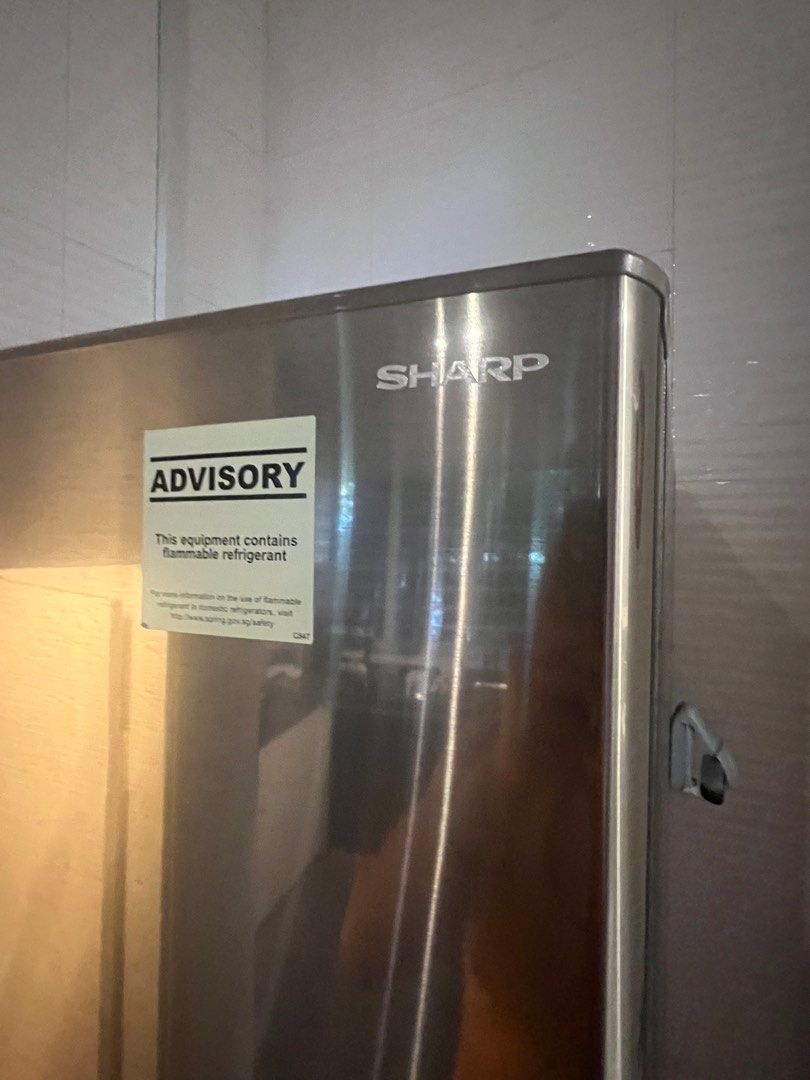 Sharp fridge (Category: Refrigerators & Freezers) located in Singapore. Submitted by naamanlim (Listing ID 1242966896, Image 2). Description: Can nego price. Customer handles delivery. Dm for more info please .