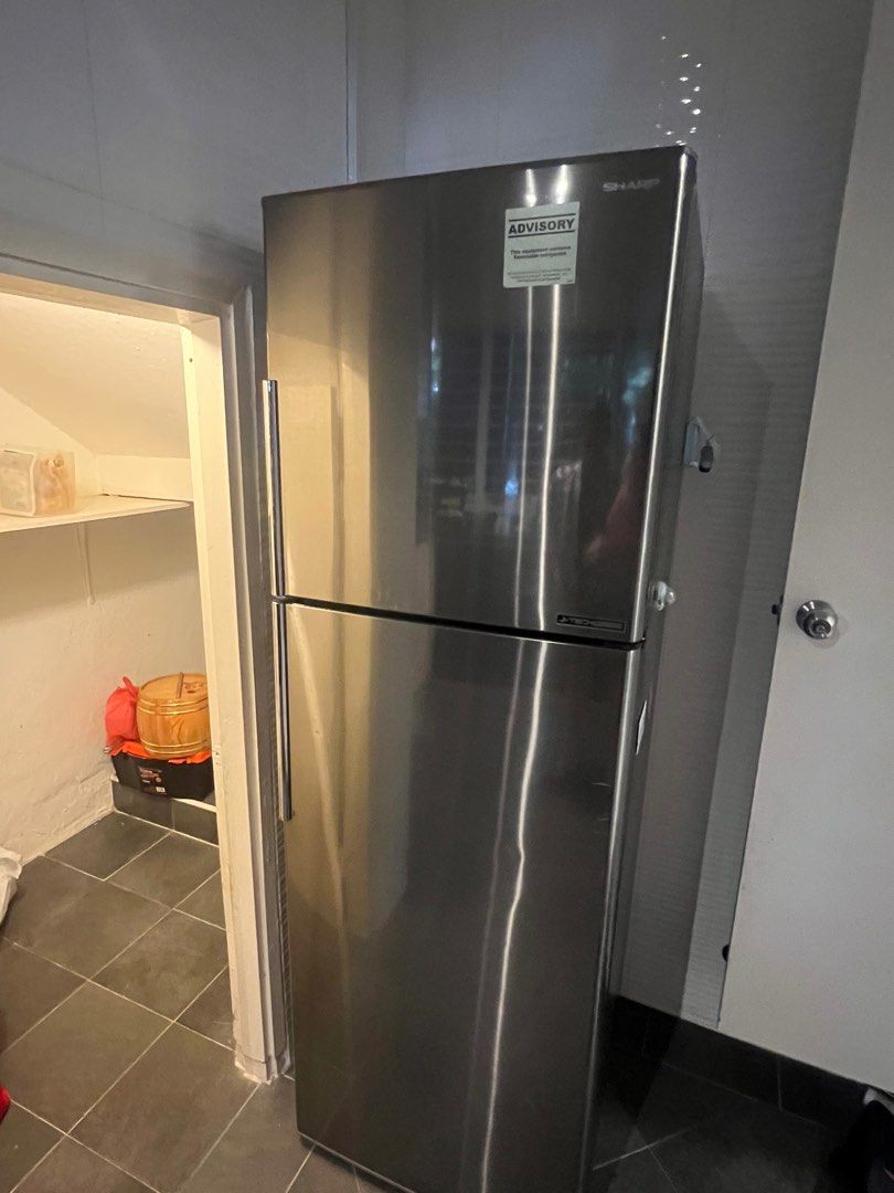 Sharp fridge (Category: Refrigerators & Freezers) located in Singapore. Submitted by naamanlim (Listing ID 1242966896, Image 1). Description: Can nego price. Customer handles delivery. Dm for more info please .