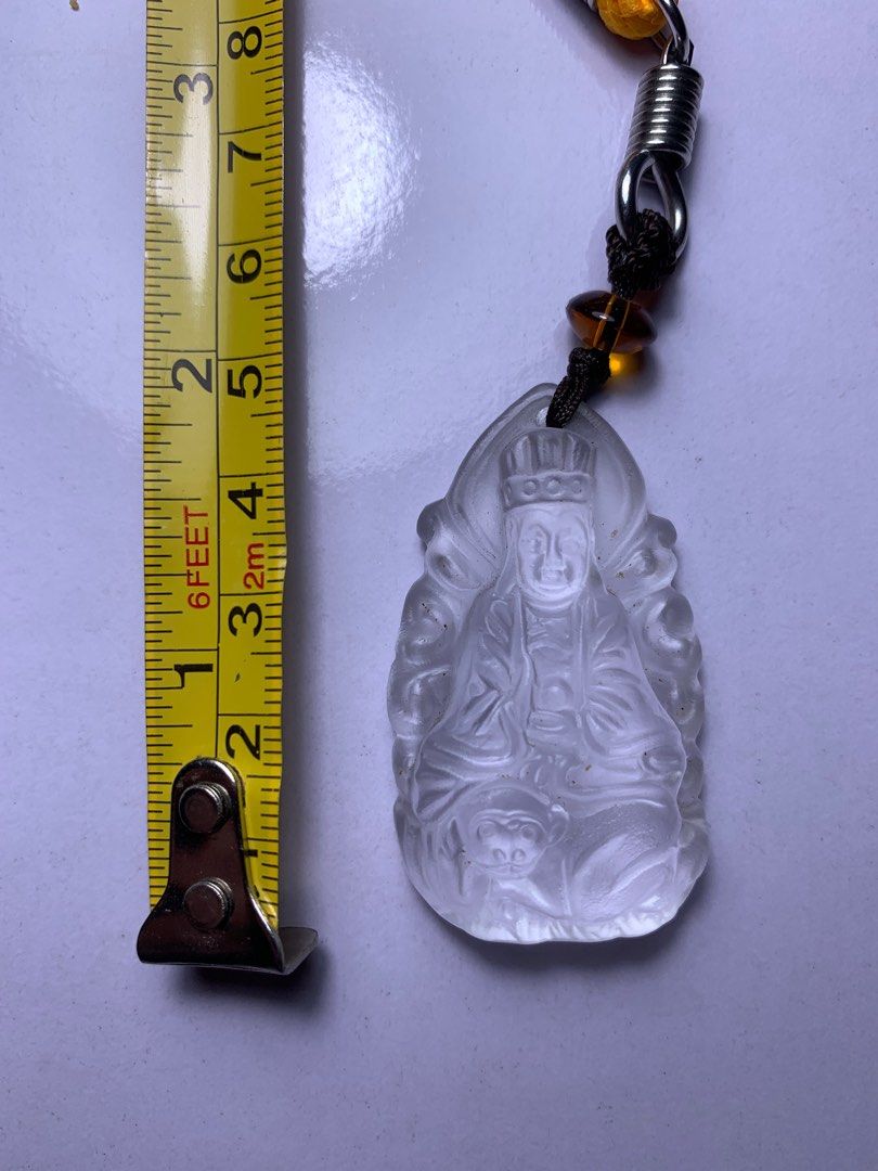 Glass buddha hotsell pendant