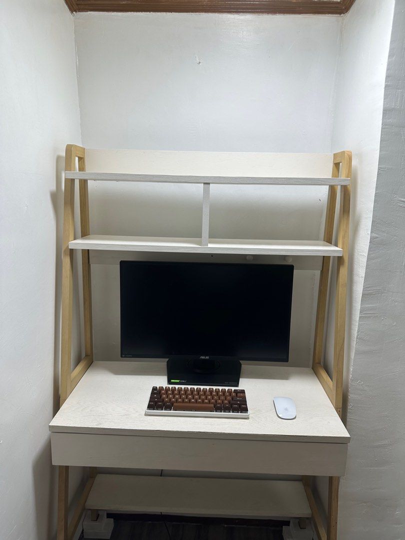 [RUSH] Desk Table Shelf With Cabinet (Category: Office Furniture & Fixtures) located in Mandaluyong City. Submitted by logbilog (Listing ID 1243089335, Image 2). Description: Selling Desk Table with Cabinet Details: Width - 84cm Depth - 40cm Height - 150cm Used for a year or two. May super kaunti pong mga gasgas due to age/use po but super super OK pa naman. The photos say it all na po, nothing much to describe except for its feet. Originally wal