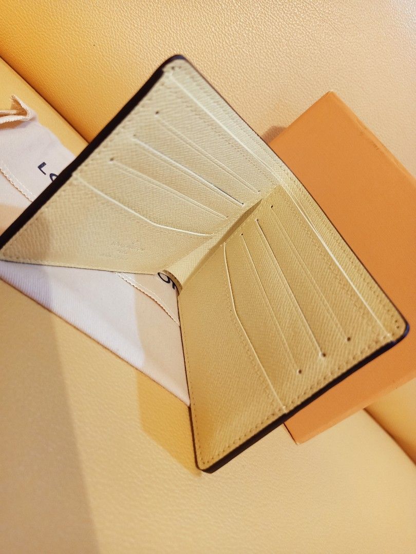 Japan Preloved Lv by fold wallet (Category: Luxury Bags & Wallets) located in Cebu City. Submitted by day.98 (Listing ID 1243138899, Image 3). Description: selected from japan surplus genuine leathe coded with box no flaws.