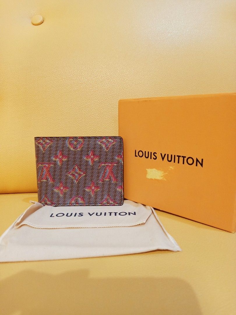 Japan Preloved Lv by fold wallet (Category: Luxury Bags & Wallets) located in Cebu City. Submitted by day.98 (Listing ID 1243138899, Image 1). Description: selected from japan surplus genuine leathe coded with box no flaws.
