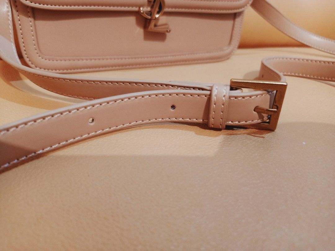 Japan Preloved YSL sling (Category: Luxury Bags & Wallets) located in Cebu City. Submitted by day.98 (Listing ID 1243133608, Image 3). Description: selected from japan surplus genuine leather coded & etikita meduim size no flaws.