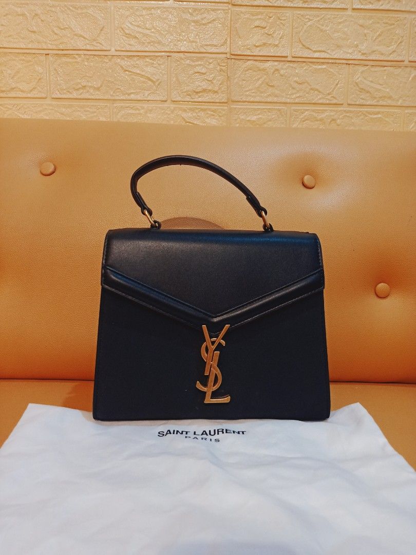 Japan Preloved YSL Sling bag (Category: Luxury Bags & Wallets) located in Cebu City. Submitted by day.98 (Listing ID 1243130587, Image 2). Description: selected from japan surplus genuine leather coded & etikita meduim size no flaws.