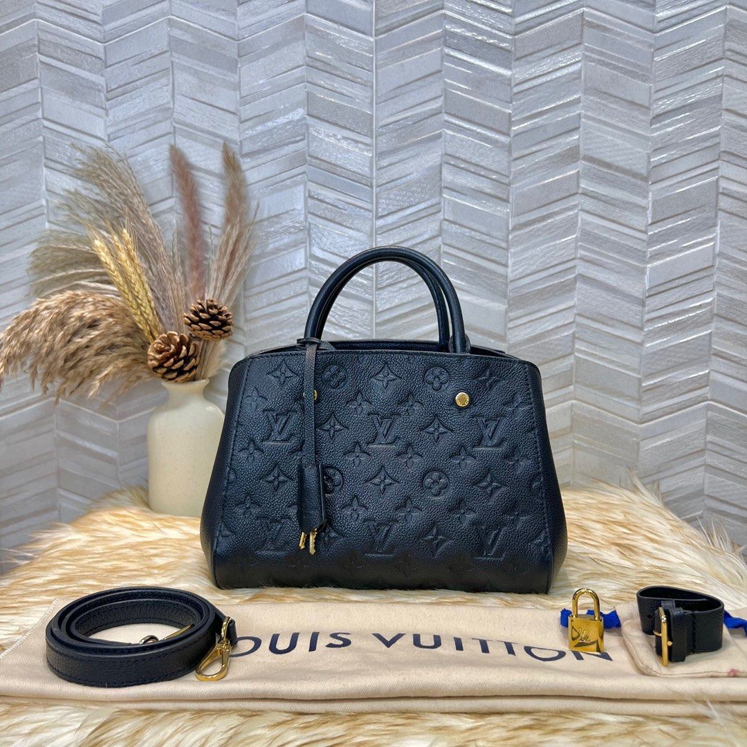 Montaigne BB bag in black imprint leather Louis Vuitton - Second Hand /  Used – Vintega
