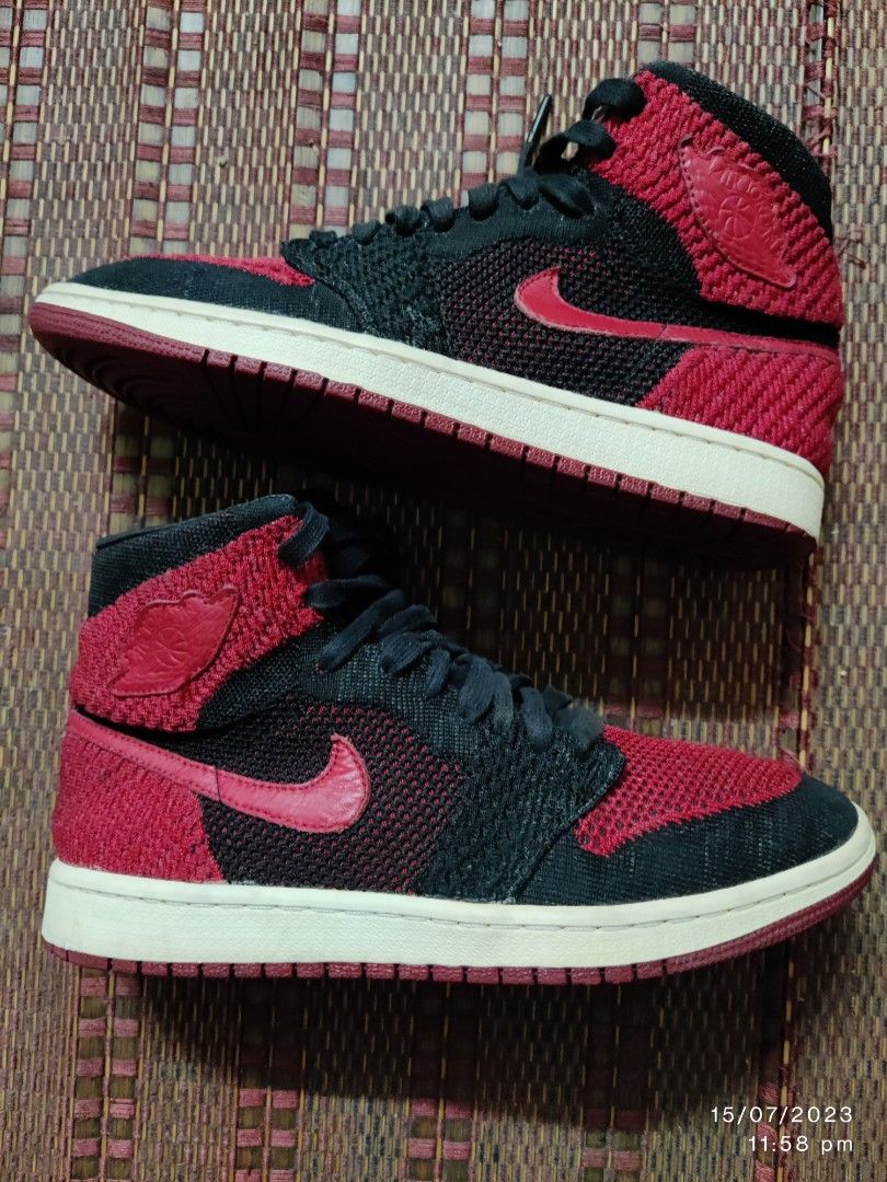 NIKE AJ1 FLYKNIT RETRO BRED SNEAKERS
