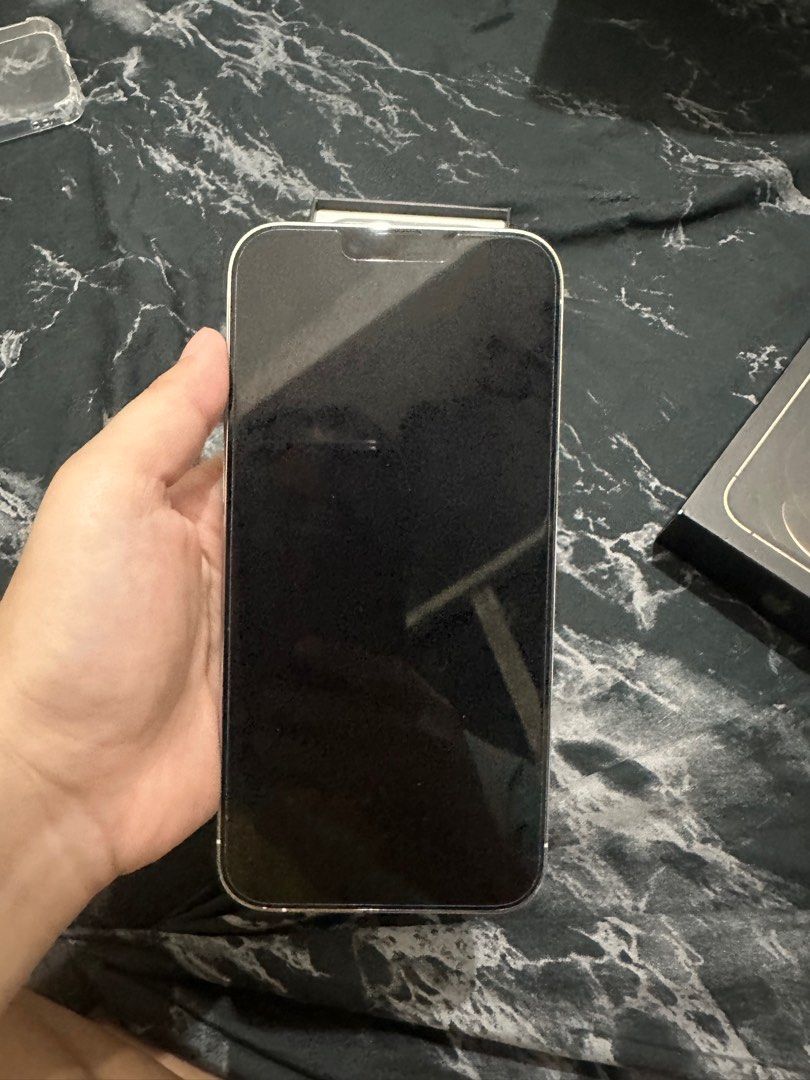 Preloved Iphone 13 Promax (Category: iPhone 13 Series) located in Quezon City. Submitted by madamsgadgetsshop (Listing ID 1243087890, Image 2). Description: IPHONE 13 PROMAX 1TB SILVER ✅89% BATTERY HEALTH ✅NO HISTORY OF REPAIR ✅COMPLTE WITH BOX AND CABLE ✅NO DENTS/SCRATCHES ✅SMARTLOCK FREE CASE AND TEMPERED.