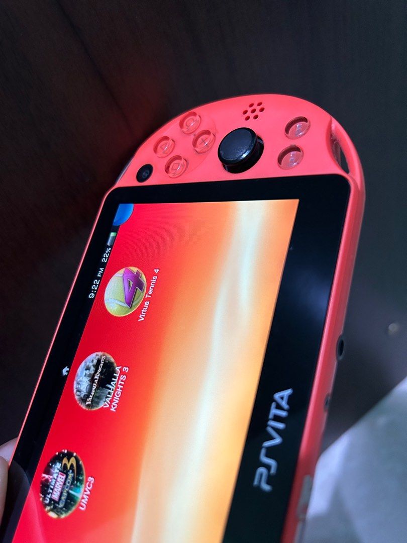 Psvita slim orange like new on Carousell