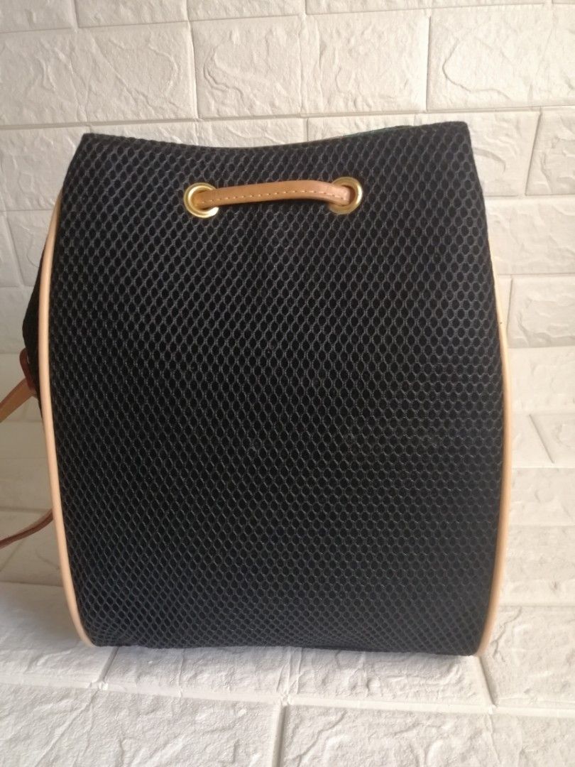 Rare Double Fish Bucket Sling Bag (Category: Luxury Bags & Wallets) located in Las Pinas. Submitted by etoksi1234 (Listing ID 1243250991, Image 3). Description: Pre-loved Rare Double Fish bucket sling bag. Canvas with Leather Combination. With normal signs of wear only. Please zoom in photos for reference. Please manage your expectations. All sales are final. Kindly examine pictures carefully when buying online. No return, exchange policy..