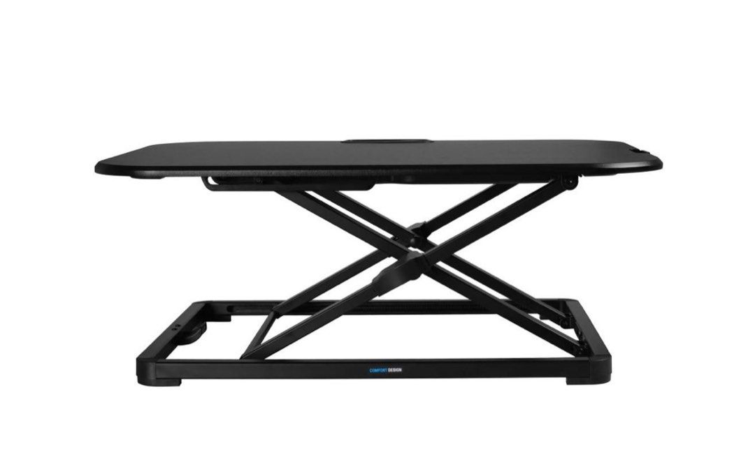 Sit/stand table riser (Category: Other Home Furniture) located in Singapore. Submitted by vanlwi (Listing ID 1243231210, Image 1). Description: Purchased from comfort design furniture. Listed item is version 1, currently comfort design furniture is selling version 2. Not much diff though. .