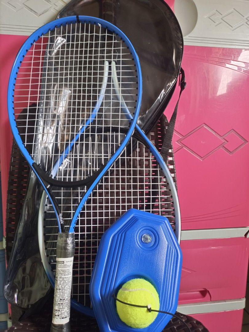 Tennis racket w/ball on Carousell