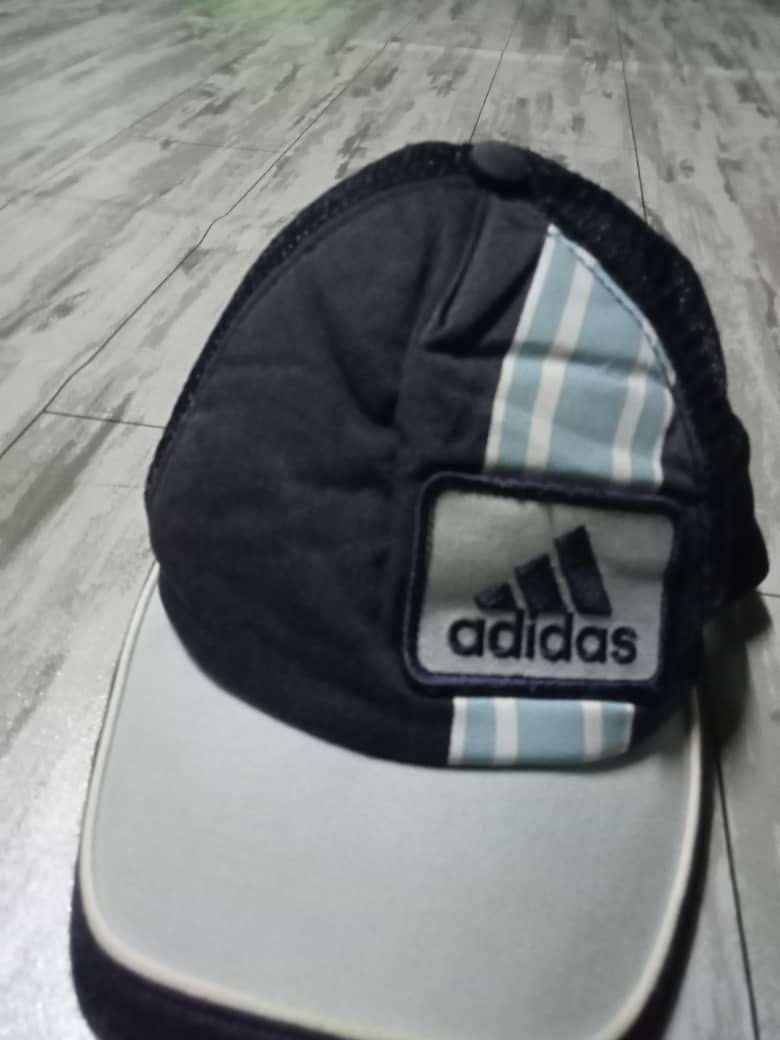 Adidas cap (Category: Cap & Hats) located in Seberang Jaya. Submitted by afiqfatani86 (Listing ID 1243383313, Image 1). Description: Tidak termasuk pos.