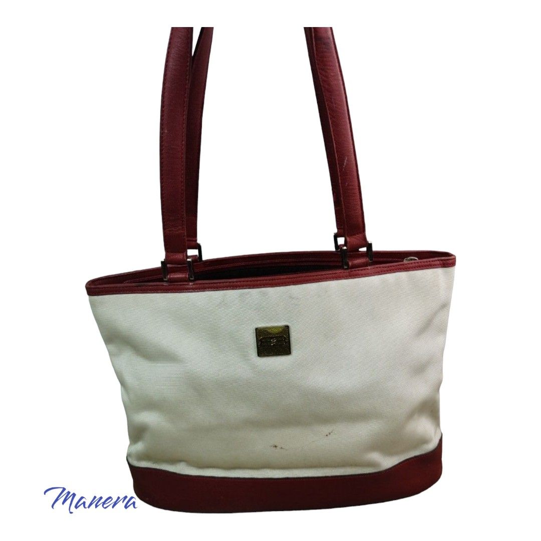 authentic BALENCIAGA tote vintage (Category: Luxury Bags & Wallets) located in Quezon City. Submitted by manerarestorationservices (Listing ID 1201657831, Image 1). Description: Money back Guarantee 💯% Gauranteed authentic BALENCIAGA tote vintage *Color: cream & red *Size: Medium *Condition: 7/10 never been spa -Used * Inclusions: bag alone see photos carefully *You're buying PRE-OWNED pls manage your expectations *Lalamove/lbc after payment con