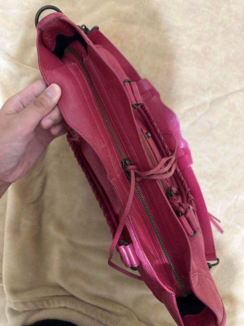 RUSH! Balenciaga City Medium (Category: Luxury Bags & Wallets) located in Davao. Submitted by e1e_ven (Listing ID 1243439360, Image 3). Description: Balenciaga City Medium Guaranteed authentic 8.5/10 condition Used only during occasions Still with mirror Flaws: check photos Hardware - 8.5/10 Leather - 10/10 No dustbag included but can provide an alternative Fixed Price, Non-negotiable. 25k to 18k, NO MORE HAGGLING.