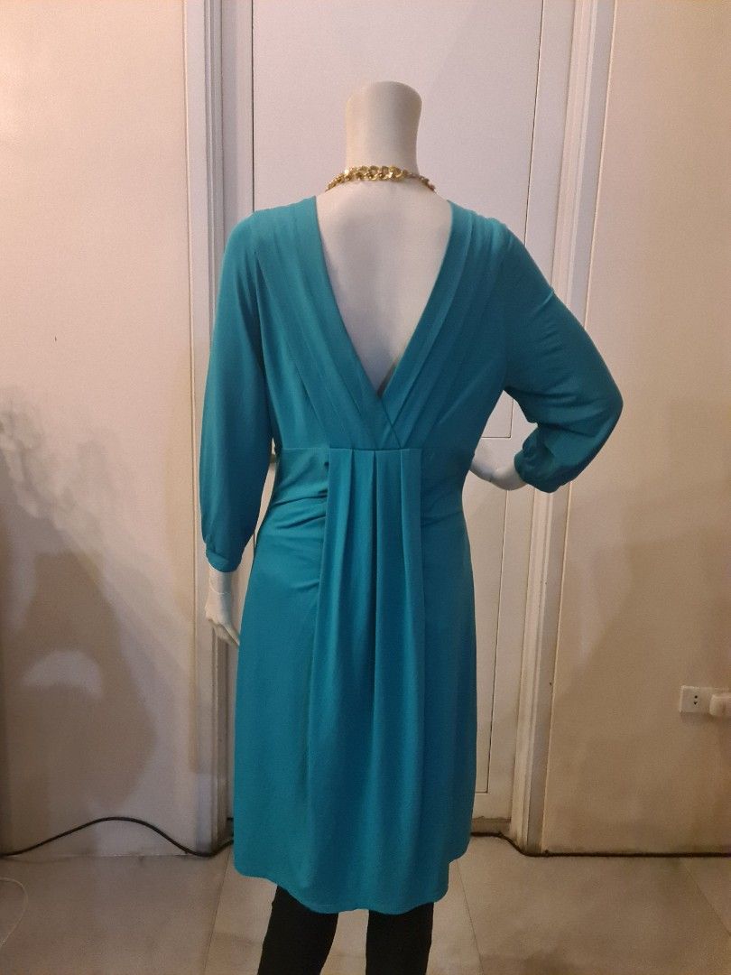 BCBG Teal green v neck dress nwot (Category: Dresses) located in Malabon City. Submitted by mersrufino (Listing ID 1243435829, Image 3). Description: new without tags low v neck drapey stretchy fabric large on tag great for parties shoulder 14 armpit 18 length 40 great deal for an unworn designer piece.