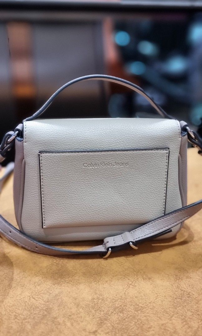 Calvin Klein phone crossbody, Luxury, Bags & Wallets on Carousell