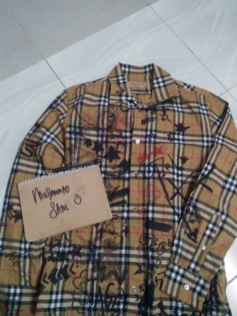 Burberry x top kris wu letra