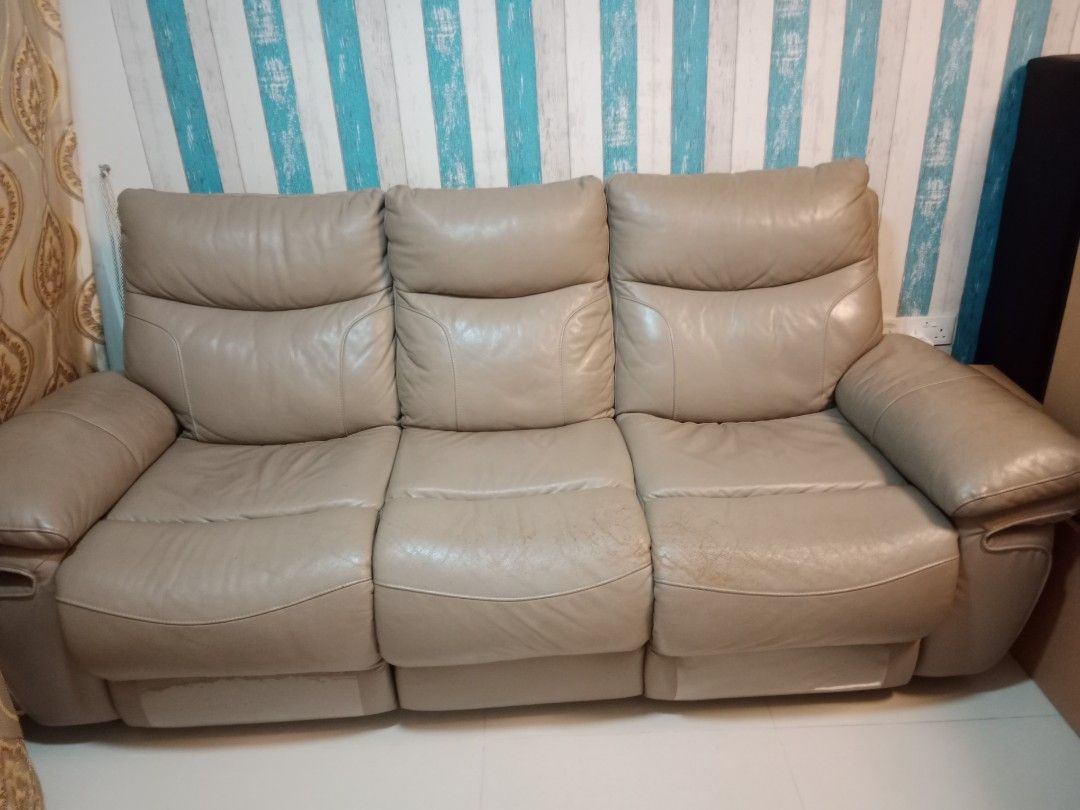 Leather Sofa (Category: Sofas) located in Singapore. Submitted by mini_moov (Listing ID 1243420521, Image 1). Description: very comfortable sofa. recliner leather sofa except for the middle one. a bit of scratch as in the pictures..but in a good condition. maybe can trade In for new sofa from any furniture shop. bought it around 1000+. used it for about 3 years. not sure if it's genuine leather or faux one..