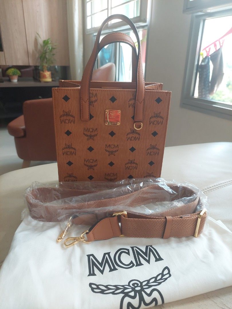 MCM (Category: Bags & Wallets) located in Singapore. Submitted by ivct8989 (Listing ID 1243319736, Image 3). Description: retail price at $1050. just use once only. letting go because i got to many tote bag.100 % authentic. come with dust bag only.negotiable for fast deal..