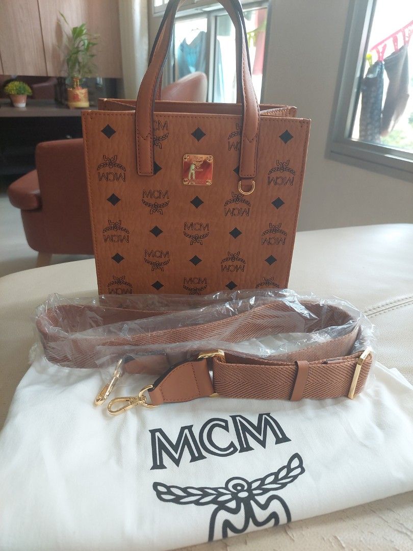 MCM (Category: Bags & Wallets) located in Singapore. Submitted by ivct8989 (Listing ID 1243319736, Image 1). Description: retail price at $1050. just use once only. letting go because i got to many tote bag.100 % authentic. come with dust bag only.negotiable for fast deal..