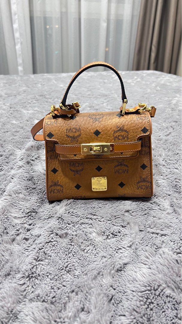 Mcm kelly bag price top