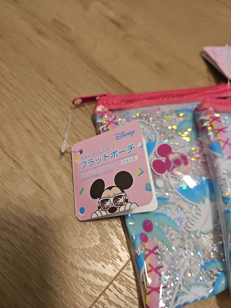 Mini Pouch (Category: Purses & Pouches) located in Singapore. Submitted by nathalie (Listing ID 1243358656, Image 2). Description: Mickey and Minnie Pouch Brand New.