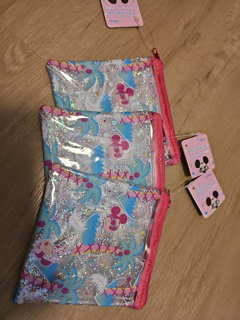 Mini Pouch (Category: Purses & Pouches) located in Singapore. Submitted by nathalie (Listing ID 1243358656, Image 1). Description: Mickey and Minnie Pouch Brand New.