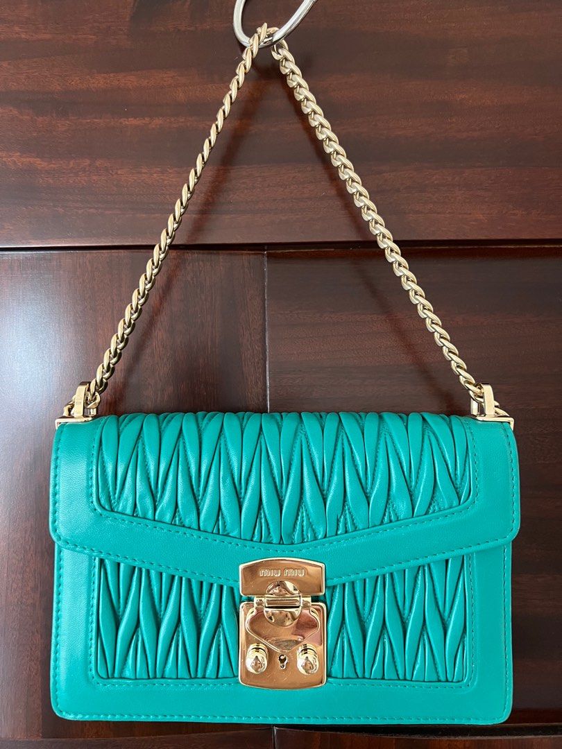 Miu confidential matelassé leather bag 2025