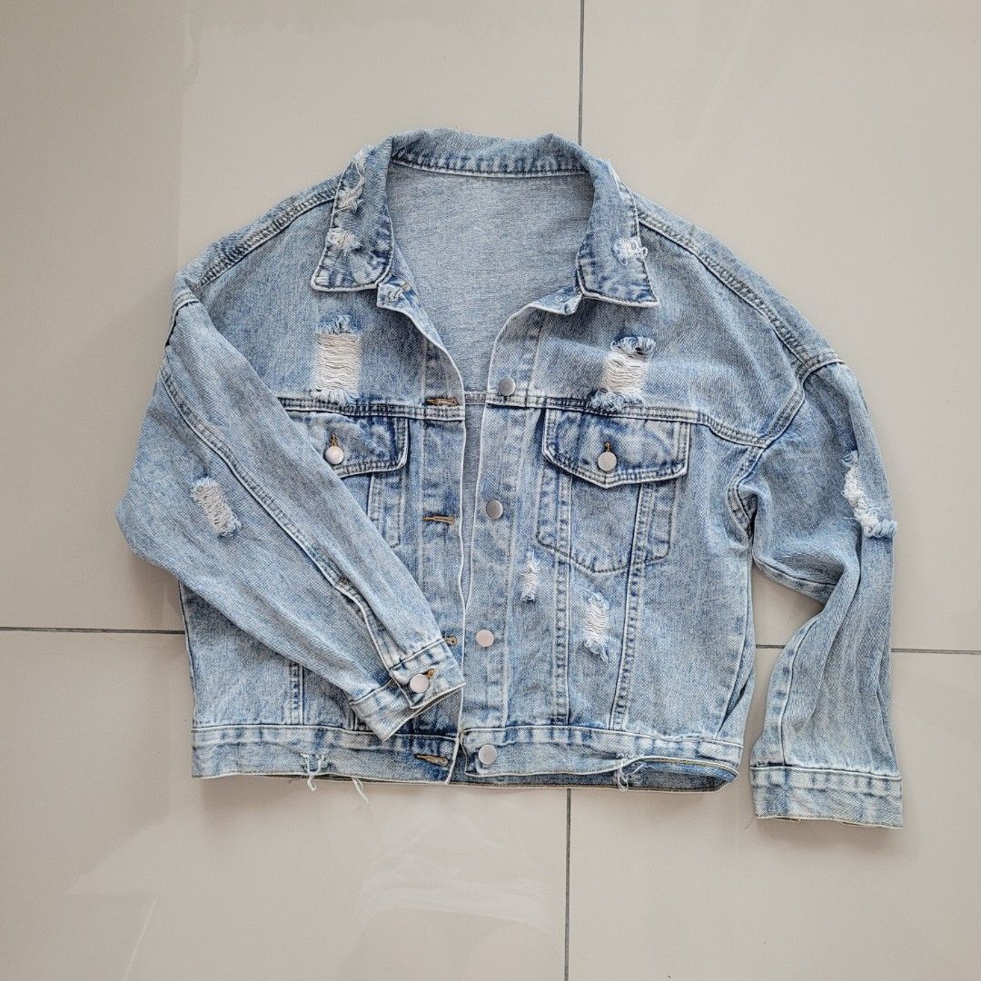 Light wash denim jacket ripped top