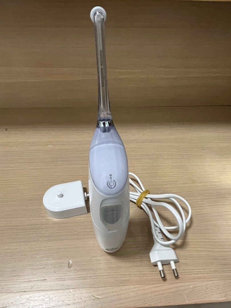Irrigador bucal sales airfloss ultra sonicare