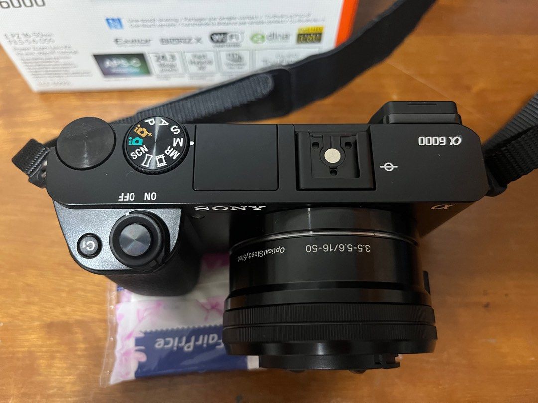 Sony A6000 with 200 shutter count, Photography, Cameras on Carousell
