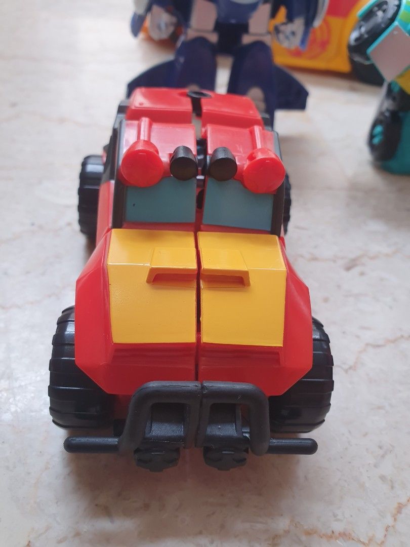 Transformers (Category: Action & Battle Toys) located in Singapore. Submitted by dualmp (Listing ID 1243328075, Image 4). Description: suitable for 3 to 5 years. 1 full set plus 1 separate car. seldom play. good and clean condition. self pick up at jurong east condo.