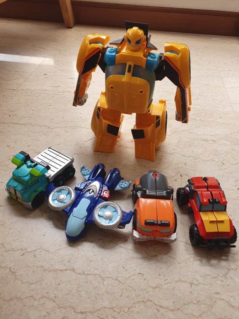 Transformers (Category: Action & Battle Toys) located in Singapore. Submitted by dualmp (Listing ID 1243328075, Image 1). Description: suitable for 3 to 5 years. 1 full set plus 1 separate car. seldom play. good and clean condition. self pick up at jurong east condo.